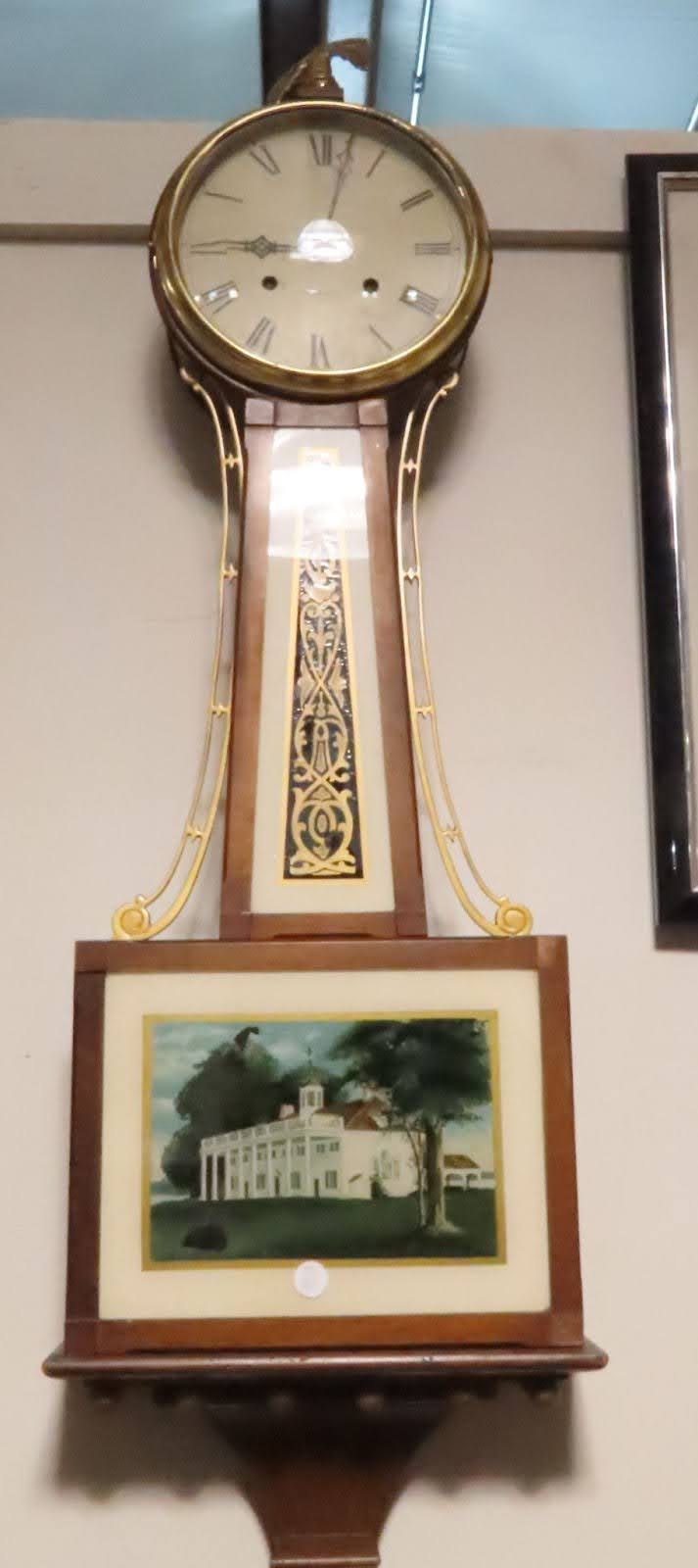 Reverse painted New Haven banjo clock unsure of working condition.