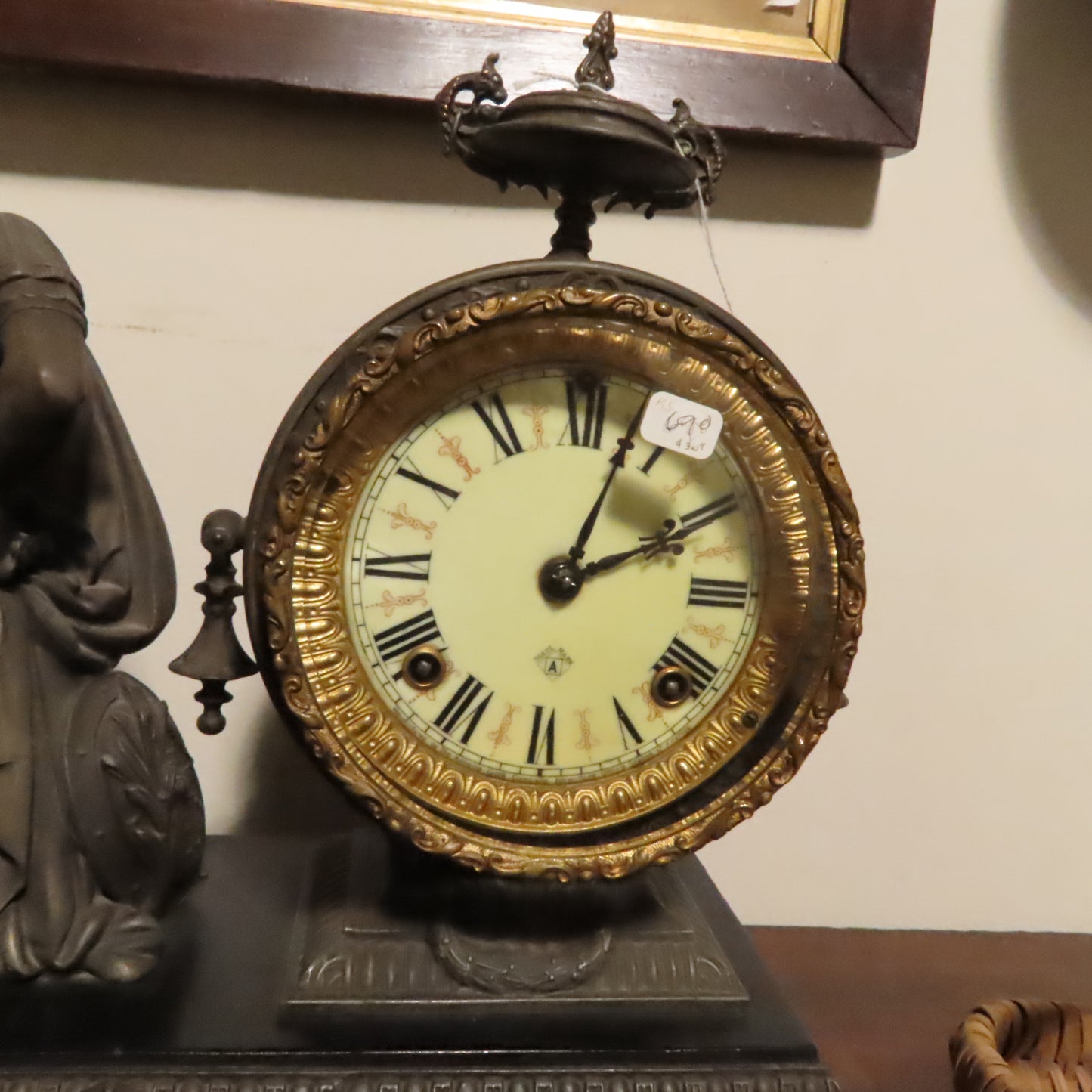 Antique Roman Figure on a Black Stone Clock on other side. Missing leg