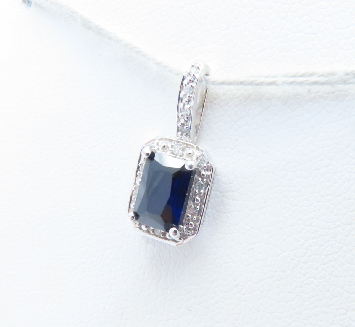 10K White Gold Emerald Cut Sapphire & Diamond Accent Halo Pendant