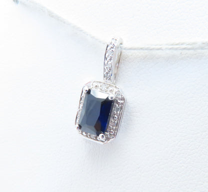 10K White Gold Emerald Cut Sapphire & Diamond Accent Halo Pendant