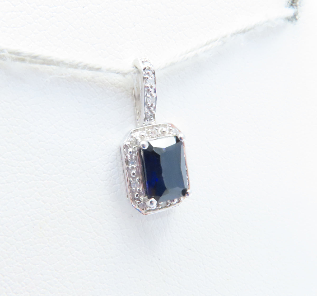 10K White Gold Emerald Cut Sapphire & Diamond Accent Halo Pendant
