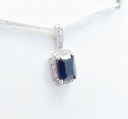 10K White Gold Emerald Cut Sapphire & Diamond Accent Halo Pendant