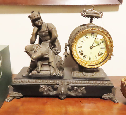 Antique Roman Figure on a Black Stone Clock on other side.  Missing leg